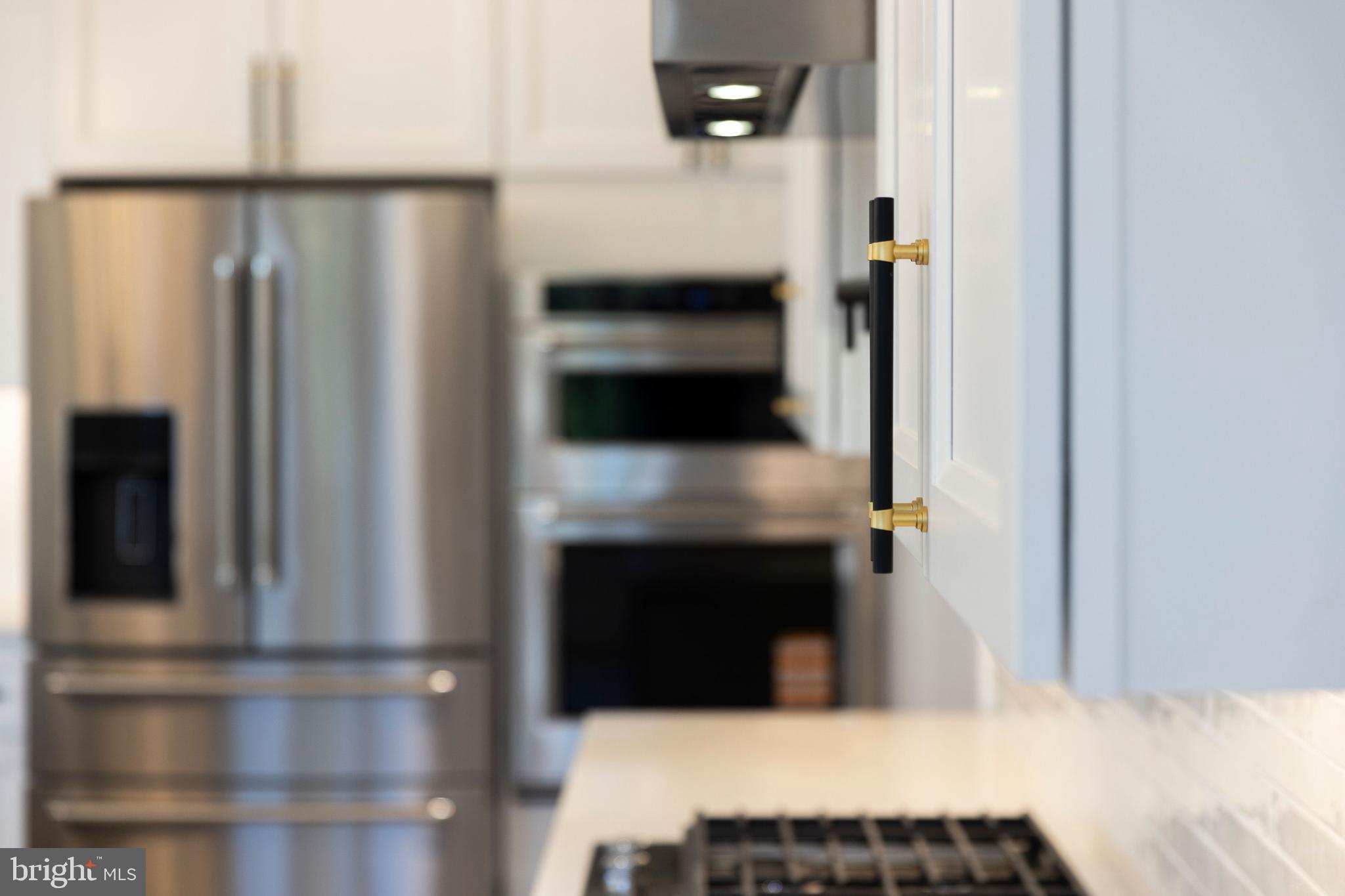 1108 Litchfield Road Baltimore, MD 21239 - Photo 58 of 109 a bedroom with a bed and a television