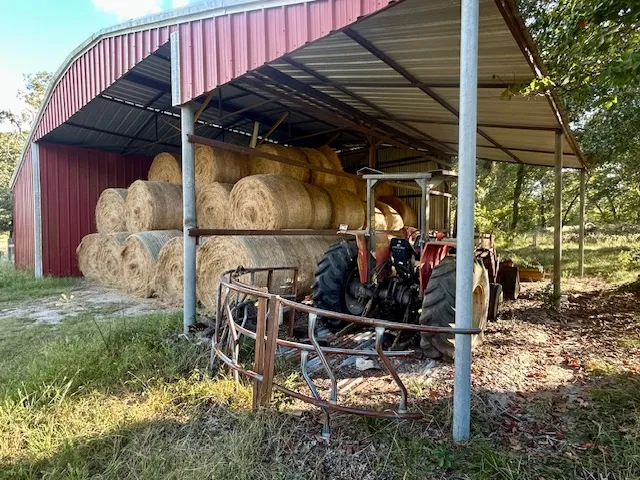 a view of a chairs and table in the patio