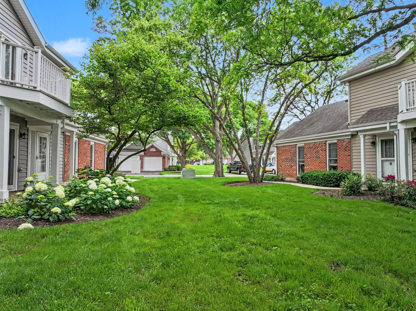 1953 North Coldspring Road Arlington Heights, IL 60004 - Photo 22 of 27 a front view of a house with garden