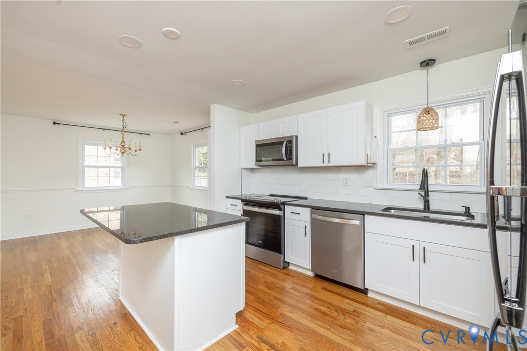 9731 Alfaree Road North Chesterfield, VA 23237 - Photo 19 of 42 Granite countertops, stainless steel, backsplash,