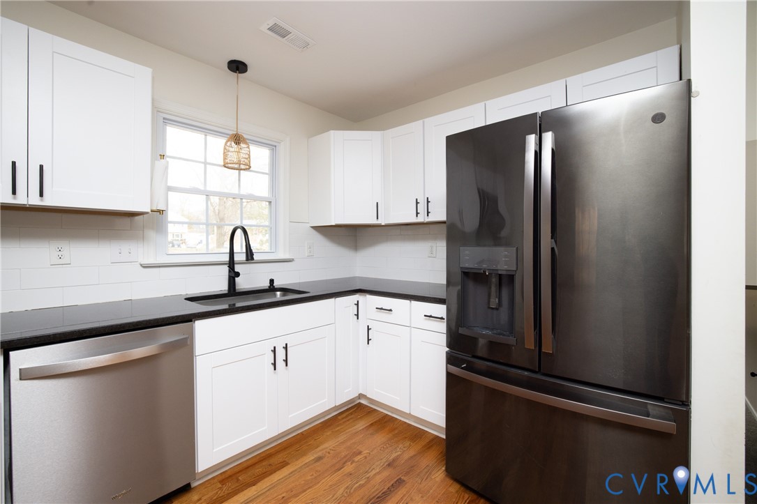 9731 Alfaree Road North Chesterfield, VA 23237 - Photo 20 of 42 Granite countertops, stainless steel, backsplash,