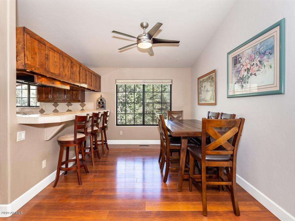 1255 Coyote Road Prescott, AZ 86303 - Photo 7 of 28 Kitchen And Formal Dining Area