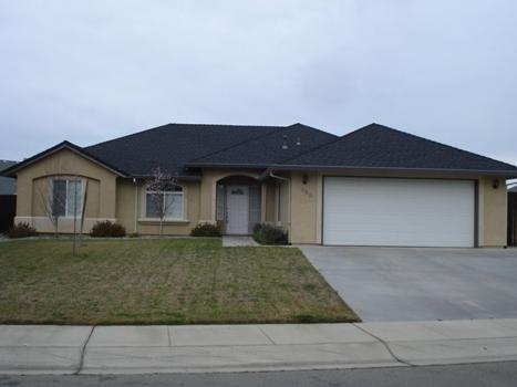 7553 Pit Road Redding, CA 96001 - Photo 1 of 12 a front view of a house with a yard