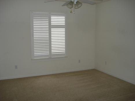 7553 Pit Road Redding, CA 96001 - Photo 3 of 12 an empty room with a window