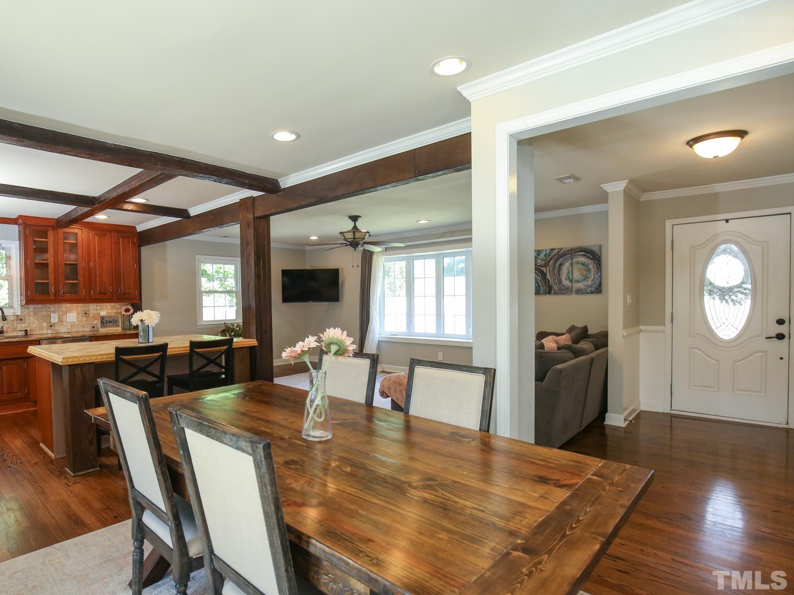 6013 Trinity Drive Raleigh, NC 27607 - Photo 12 of 30 a view of a dining room with furniture