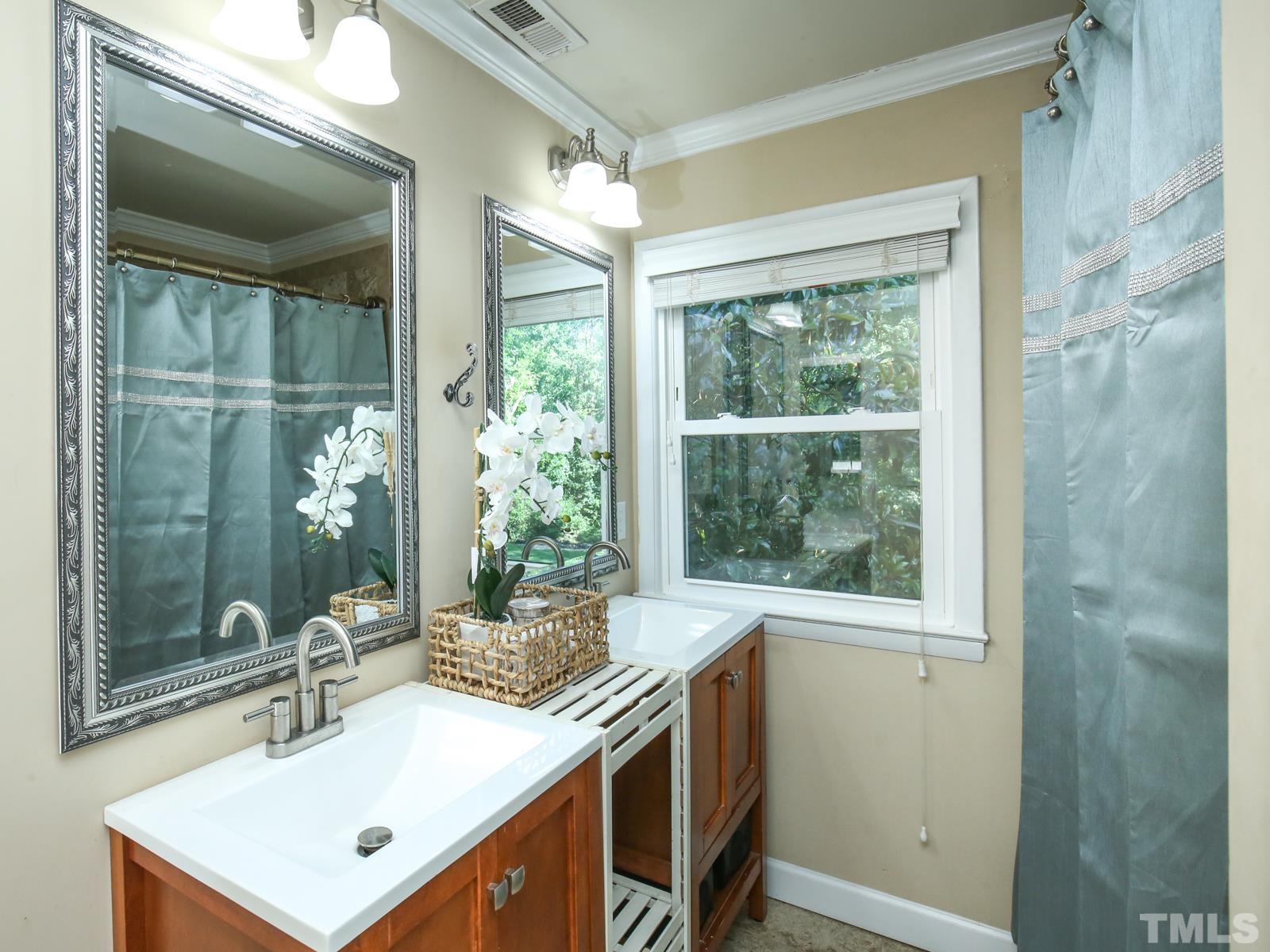 6013 Trinity Drive Raleigh, NC 27607 - Photo 16 of 30 a kitchen with a sink and a window