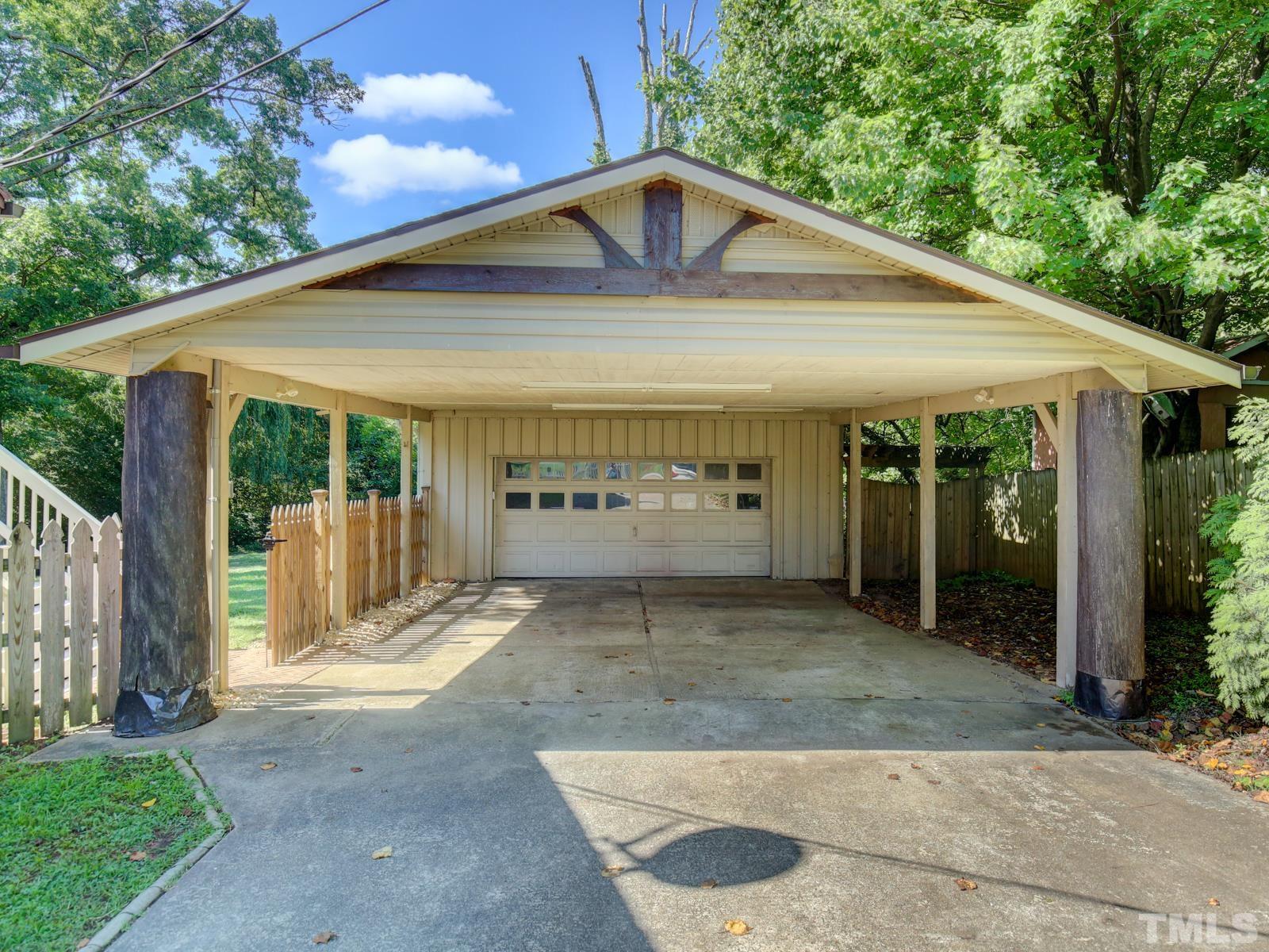 6013 Trinity Drive Raleigh, NC 27607 - Photo 3 of 30 a front view of a house with garden