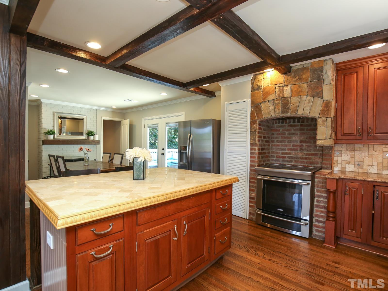 6013 Trinity Drive Raleigh, NC 27607 - Photo 10 of 30 a kitchen with sink cabinets and appliances