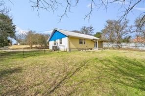 1616 North Pecos Street Lockhart, TX 78644 - Photo 25 of 27 a front view of house with yard and trees