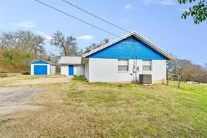 a front view of house with yard