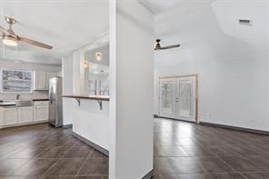 1616 North Pecos Street Lockhart, TX 78644 - Photo 6 of 27 a view of a kitchen with a white cabinet and a stove top oven