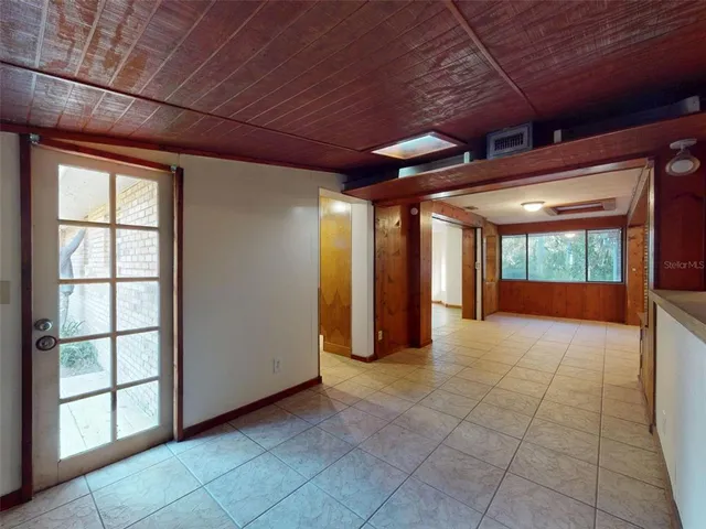 a view of a backyard with sitting area