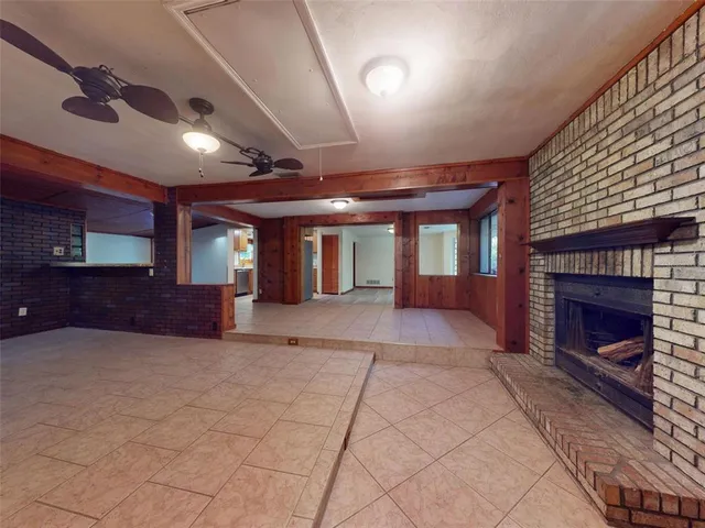 a kitchen with stainless steel appliances granite countertop a sink and a stove