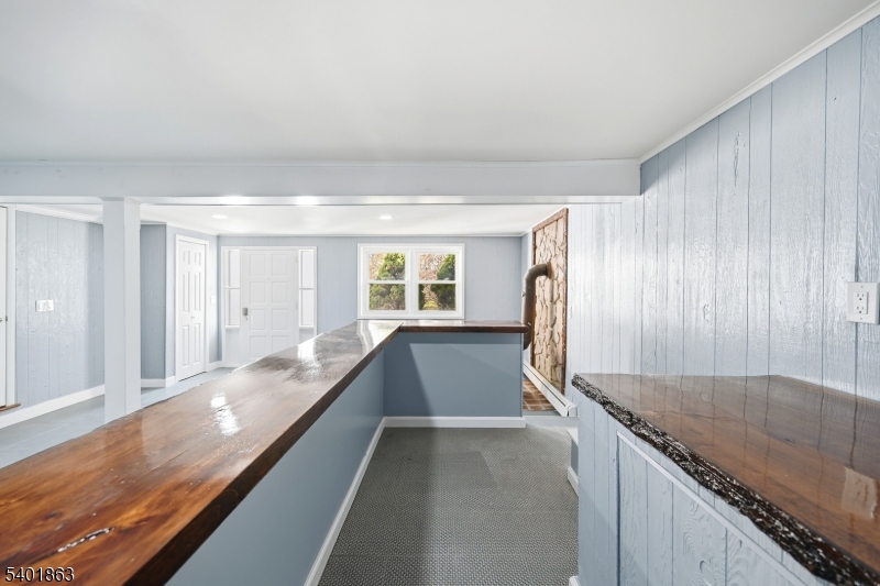 4 Rainbow Trail Vernon, NJ 07422 - Photo 11 of 41 a kitchen with granite countertop sink and refrigerator