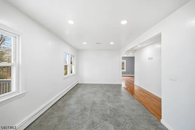 an empty room with windows