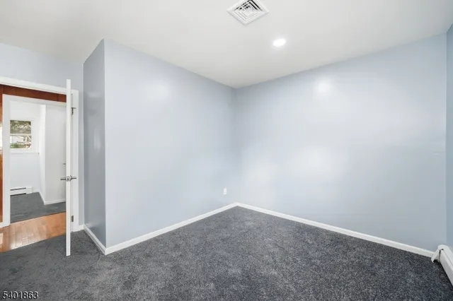 an empty room with natural light