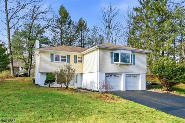 a backyard of a house with seating space