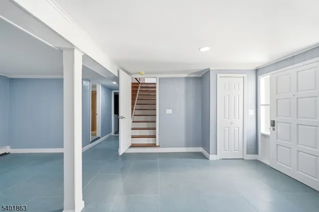 an empty room with a hallway