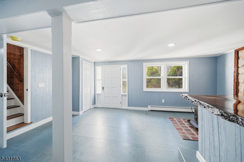 4 Rainbow Trail Vernon, NJ 07422 - Photo 7 of 41 wooden floor in an empty room with a window