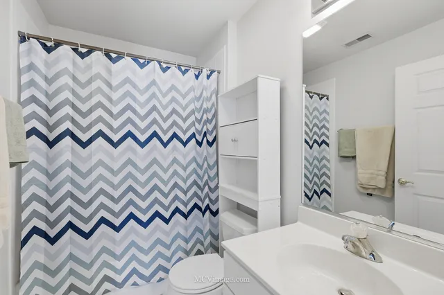 an aerial view of a house with outdoor space