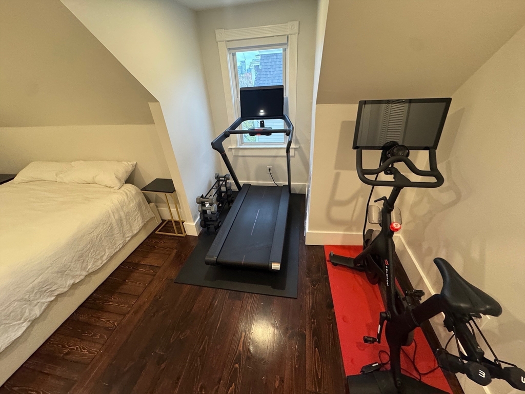 38 Pinckney Street, Unit 3 Somerville, MA 02145 - Photo 24 of 40 a bedroom with bed and wooden floor