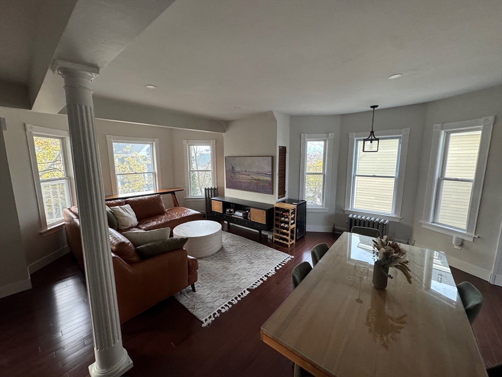 38 Pinckney Street, Unit 3 Somerville, MA 02145 - Photo 7 of 40 a living room with furniture