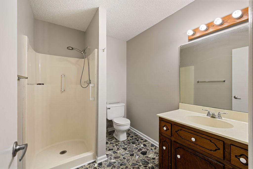 210 Salem Road Minor Hill, TN 38473 - Photo 19 of 27 a bathroom with a sink a toilet and shower