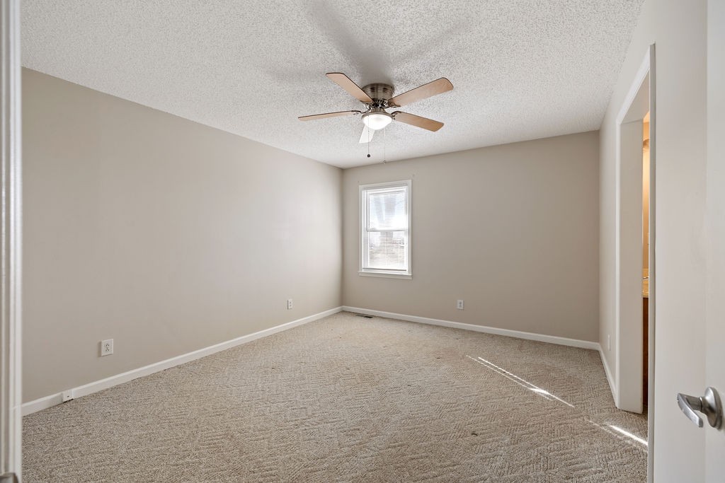 210 Salem Road Minor Hill, TN 38473 - Photo 20 of 27 a view of an empty room with a window
