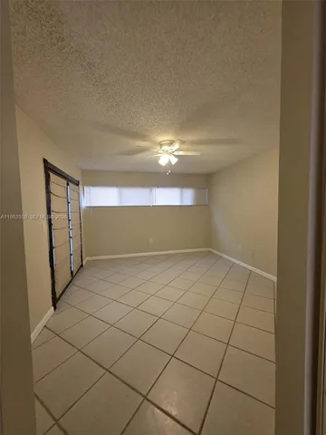a view of entryway with stairs and a window