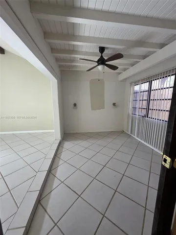 a kitchen with stainless steel appliances a refrigerator and a stove