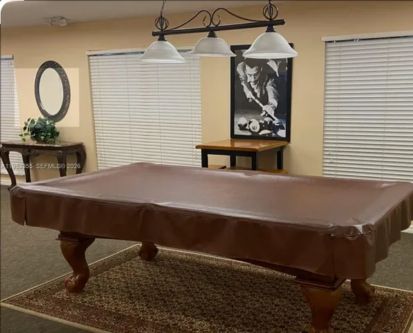 a front view of a house with swimming pool