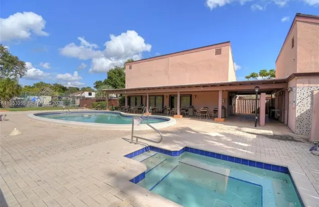 a view of outdoor space yard swimming pool and patio
