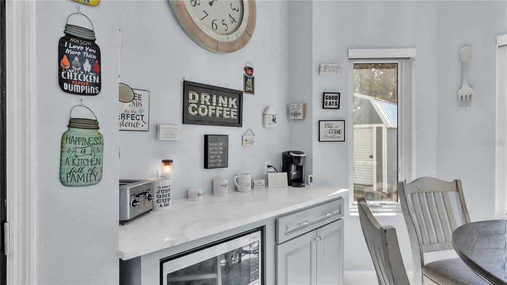 3943 West Campbell Road Lakeland, FL 33810 - Photo 18 of 71 a bathroom with a granite countertop sink and a mirror