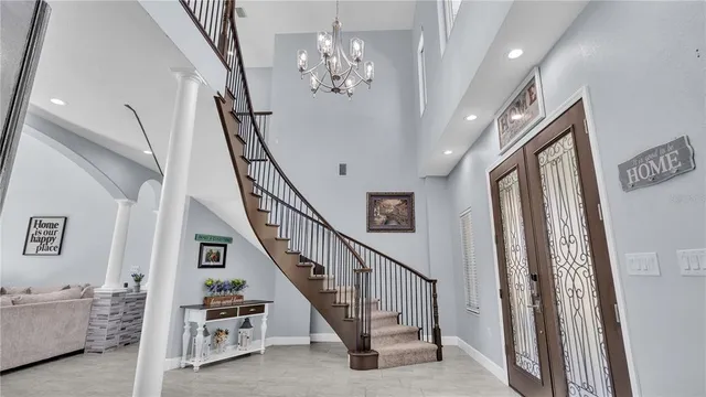 a view of walk in closet with clothes