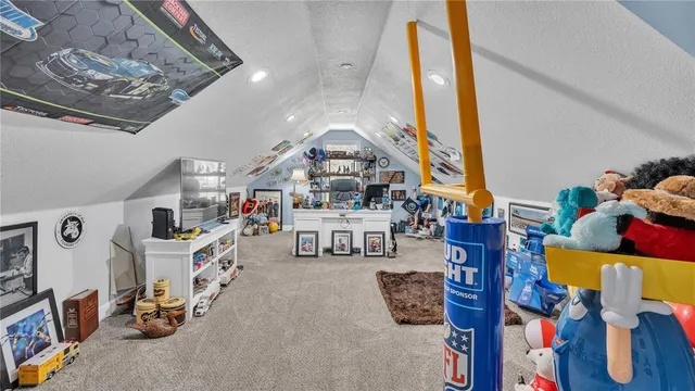 a view of house with backyard