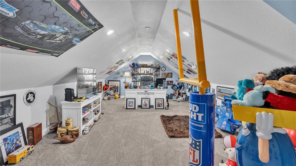 3943 West Campbell Road Lakeland, FL 33810 - Photo 45 of 71 a living room with furniture and a chandelier
