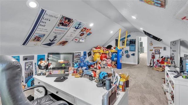 a front view of a house with plants