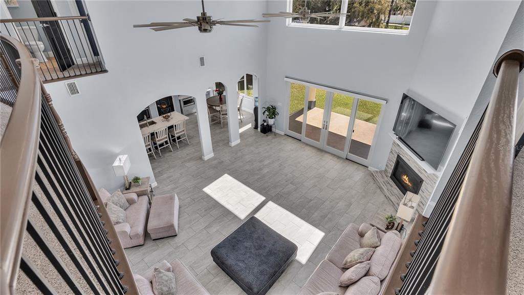 3943 West Campbell Road Lakeland, FL 33810 - Photo 63 of 71 a living room with furniture and a flat screen tv
