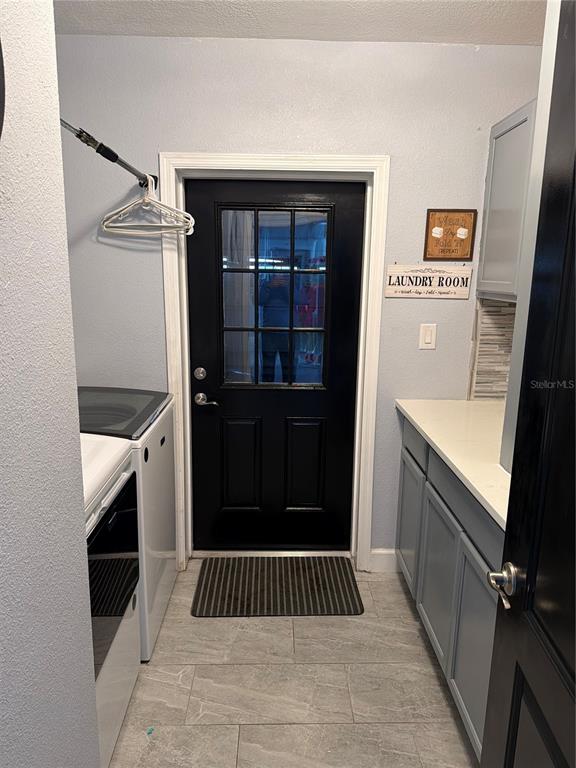 3943 West Campbell Road Lakeland, FL 33810 - Photo 10 of 71 a view of a kitchen from the hallway