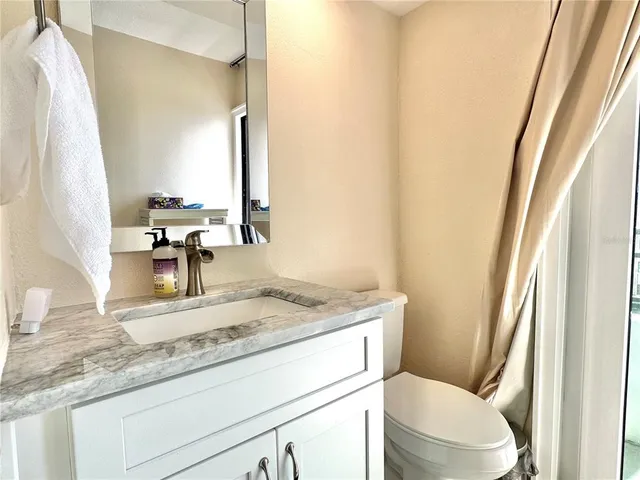 a view of a city skyline from a balcony