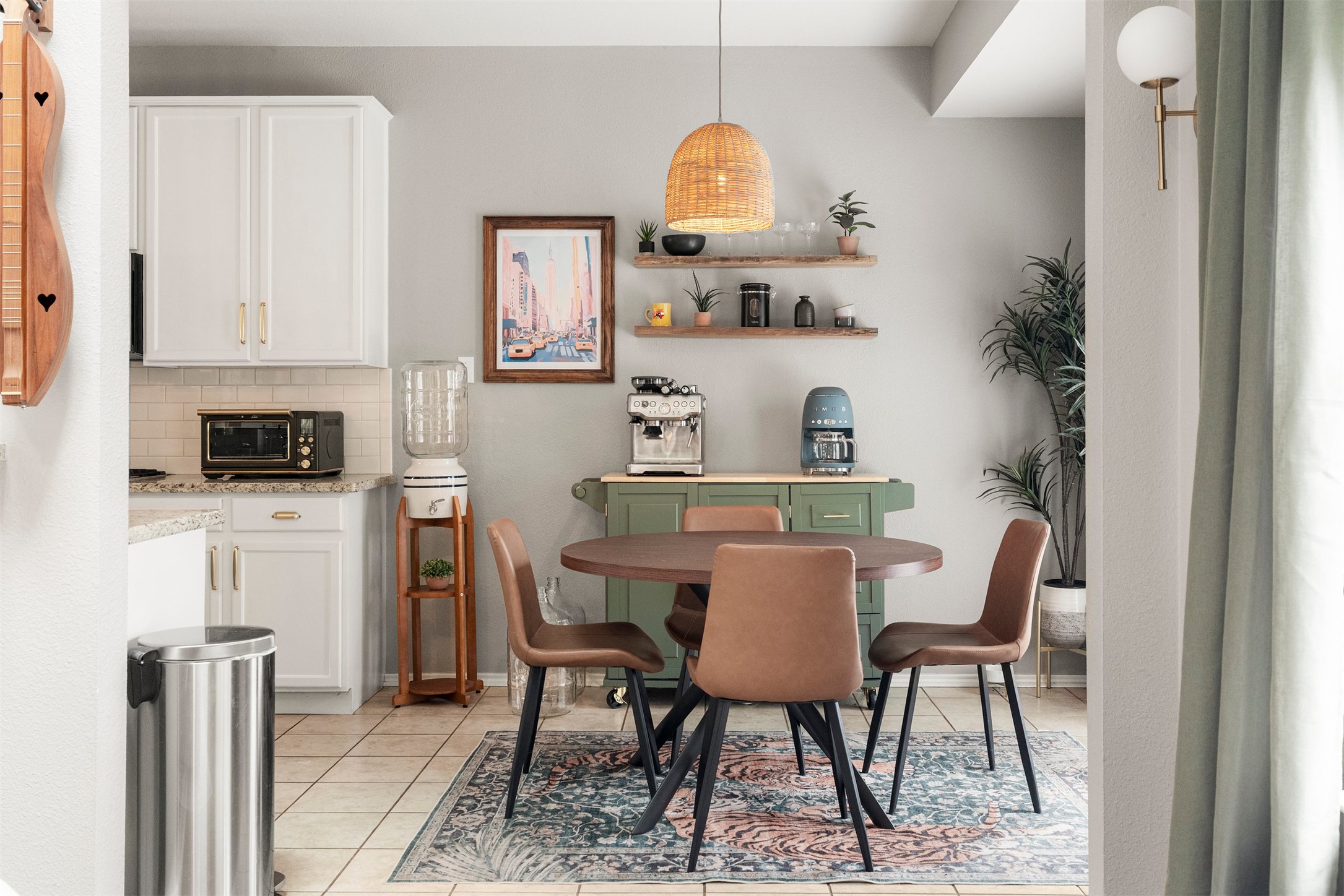 7009 Wandering Oak Road Austin, TX 78749 - Photo 20 of 36 A charming overhead pendant light defines this casual dining area, creating an intimate setting for daily breakfasts or quiet evening dinners