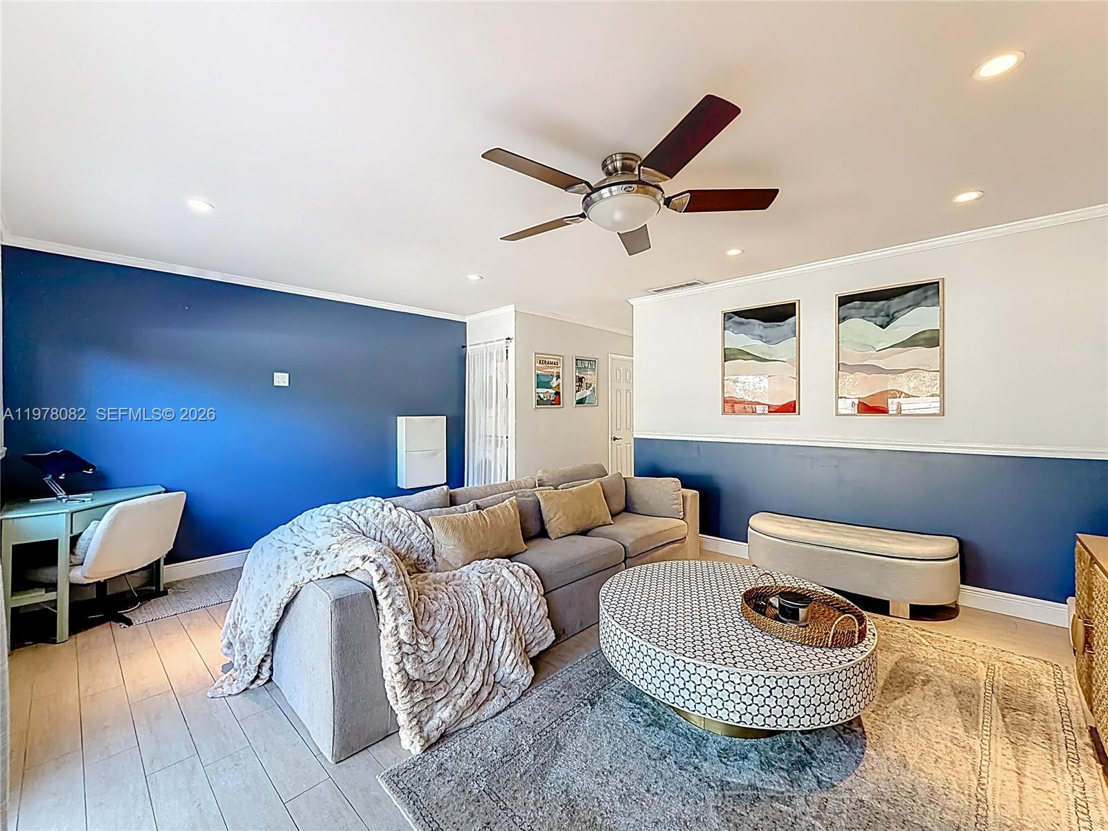 2128 Northeast 9th Avenue Wilton Manors, FL 33305 - Photo 13 of 34 a living room with furniture