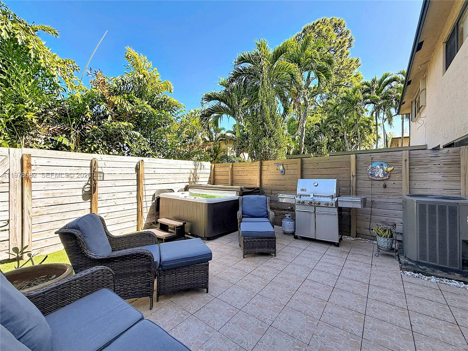 2128 Northeast 9th Avenue Wilton Manors, FL 33305 - Photo 27 of 34 a outdoor living space with furniture
