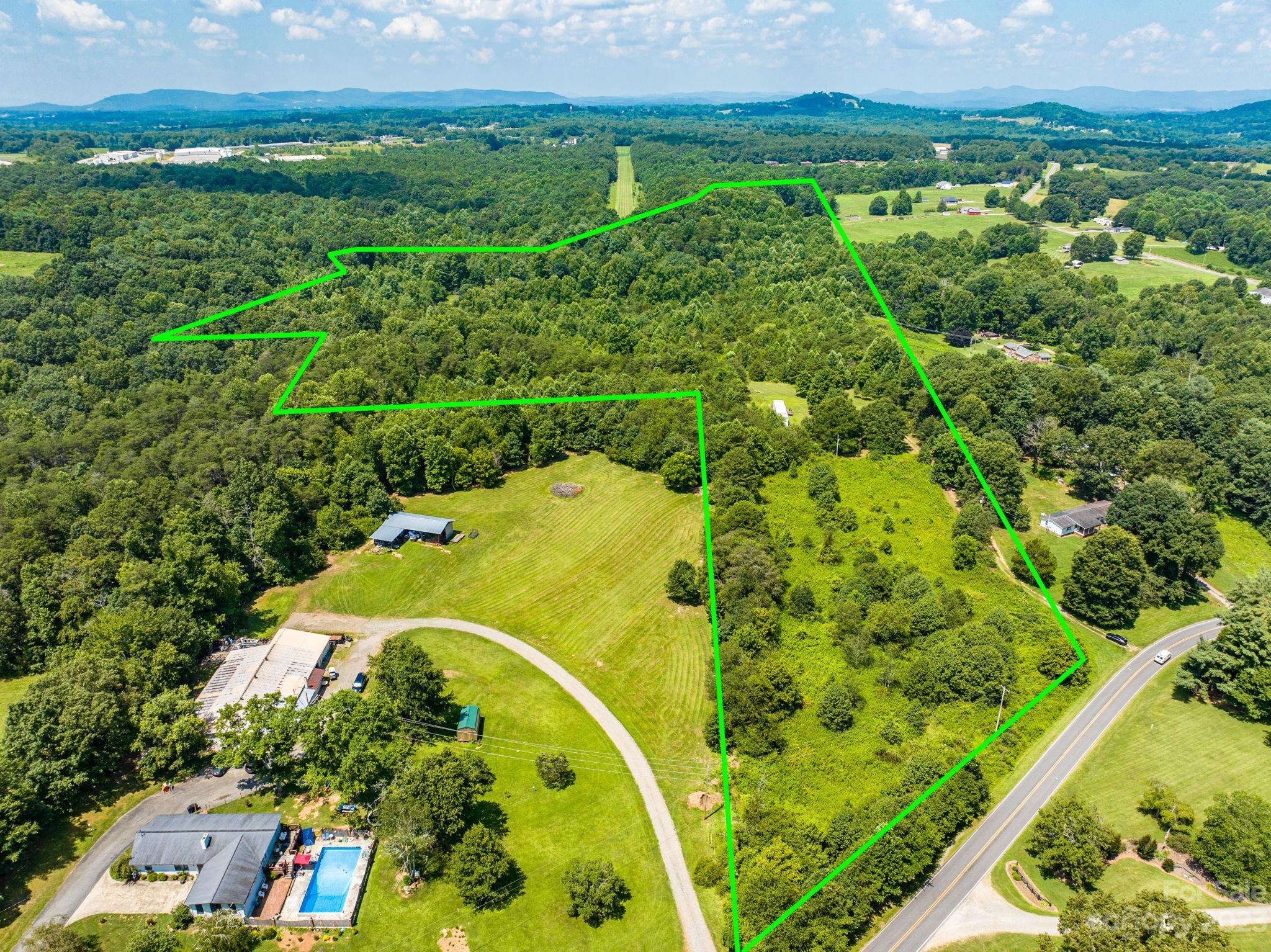 936 Goble Road Hiddenite, NC 28636 - Photo 1 of 32 an aerial view of a house