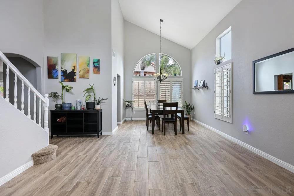 790 Mosaic Circle Oceanside, CA 92057 - Photo 20 of 47 a view of a dining room with furniture and a large window