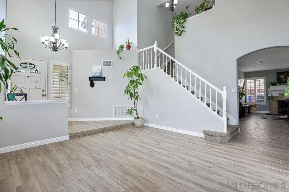 790 Mosaic Circle Oceanside, CA 92057 - Photo 22 of 47 a view of an entryway with wooden floor