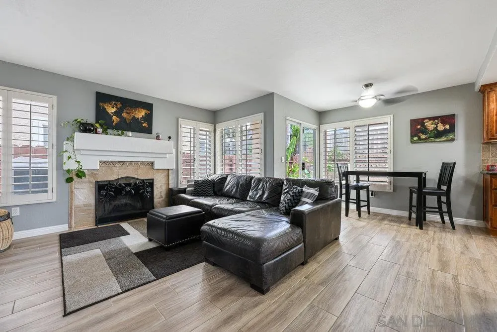 790 Mosaic Circle Oceanside, CA 92057 - Photo 27 of 47 a living room with furniture and a fireplace