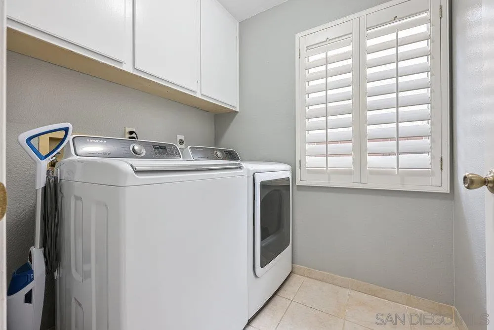 790 Mosaic Circle Oceanside, CA 92057 - Photo 30 of 47 a utility room with dryer and washer
