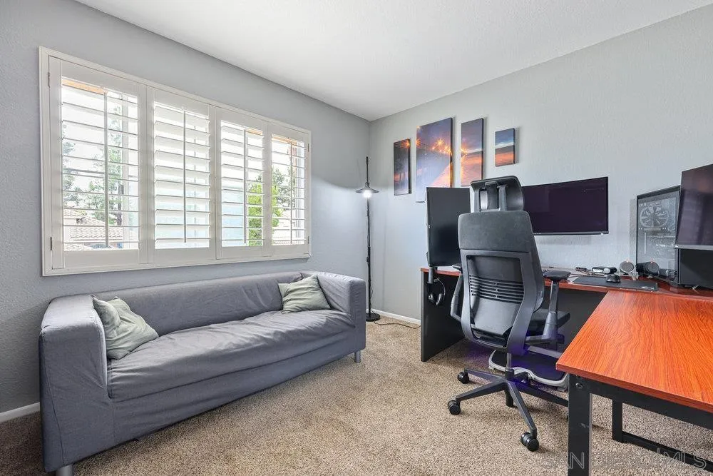 790 Mosaic Circle Oceanside, CA 92057 - Photo 34 of 47 a living room with furniture and a flat screen tv
