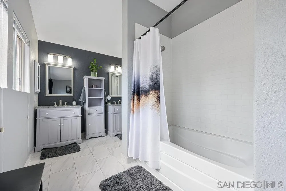790 Mosaic Circle Oceanside, CA 92057 - Photo 39 of 47 a bathroom with a bathtub a sink and a shower